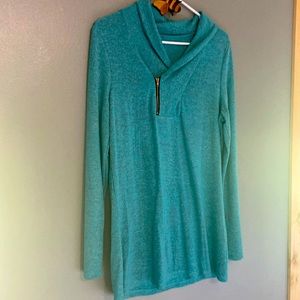 Teal and gray lightweight sweater with gold and black zipper detail.